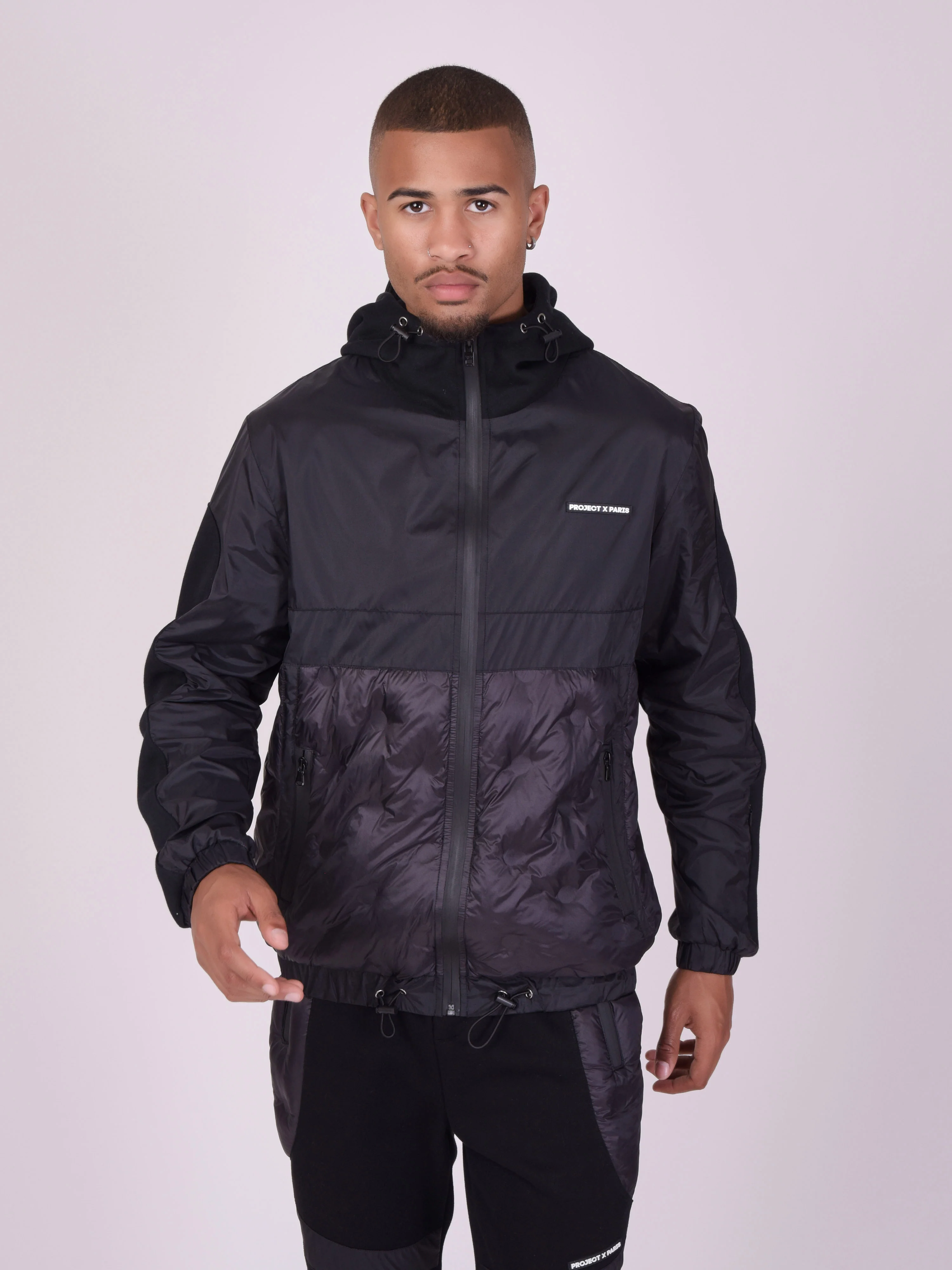 Veste à capuche bi-matière matelassage rond