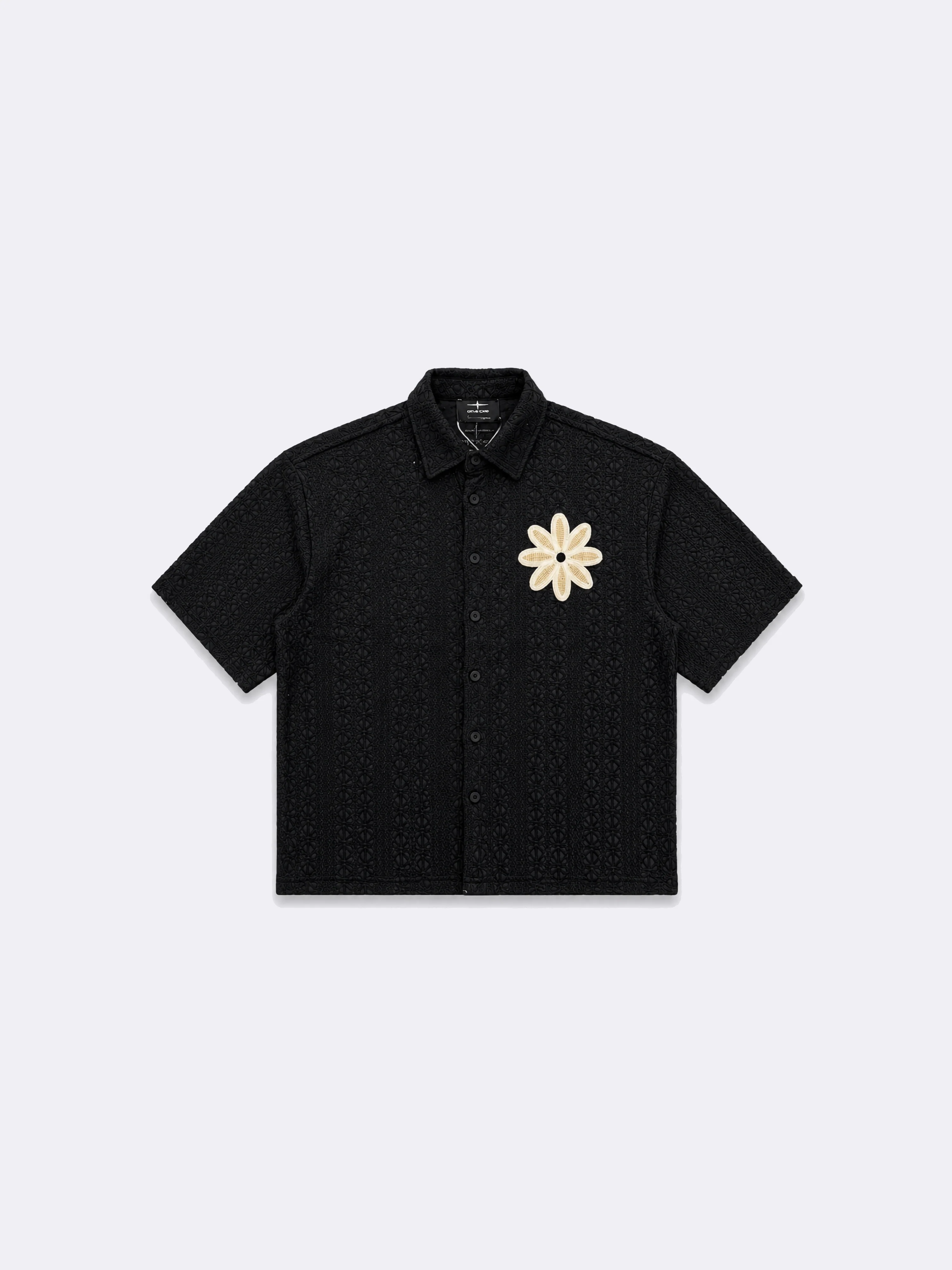 Chemise brodée ajourée avec fleur