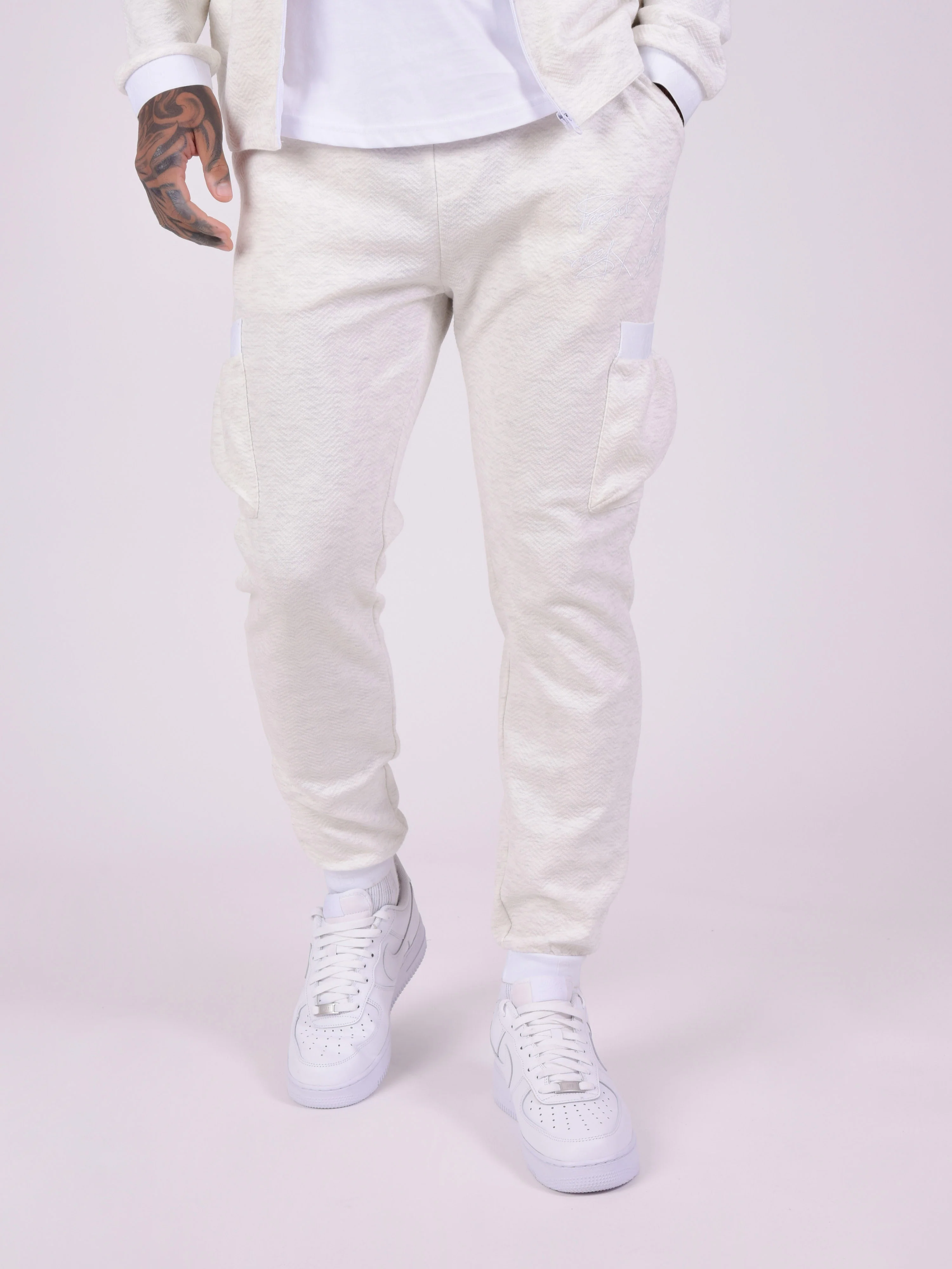 Bas de jogging en tissus texturé et details élastique sport