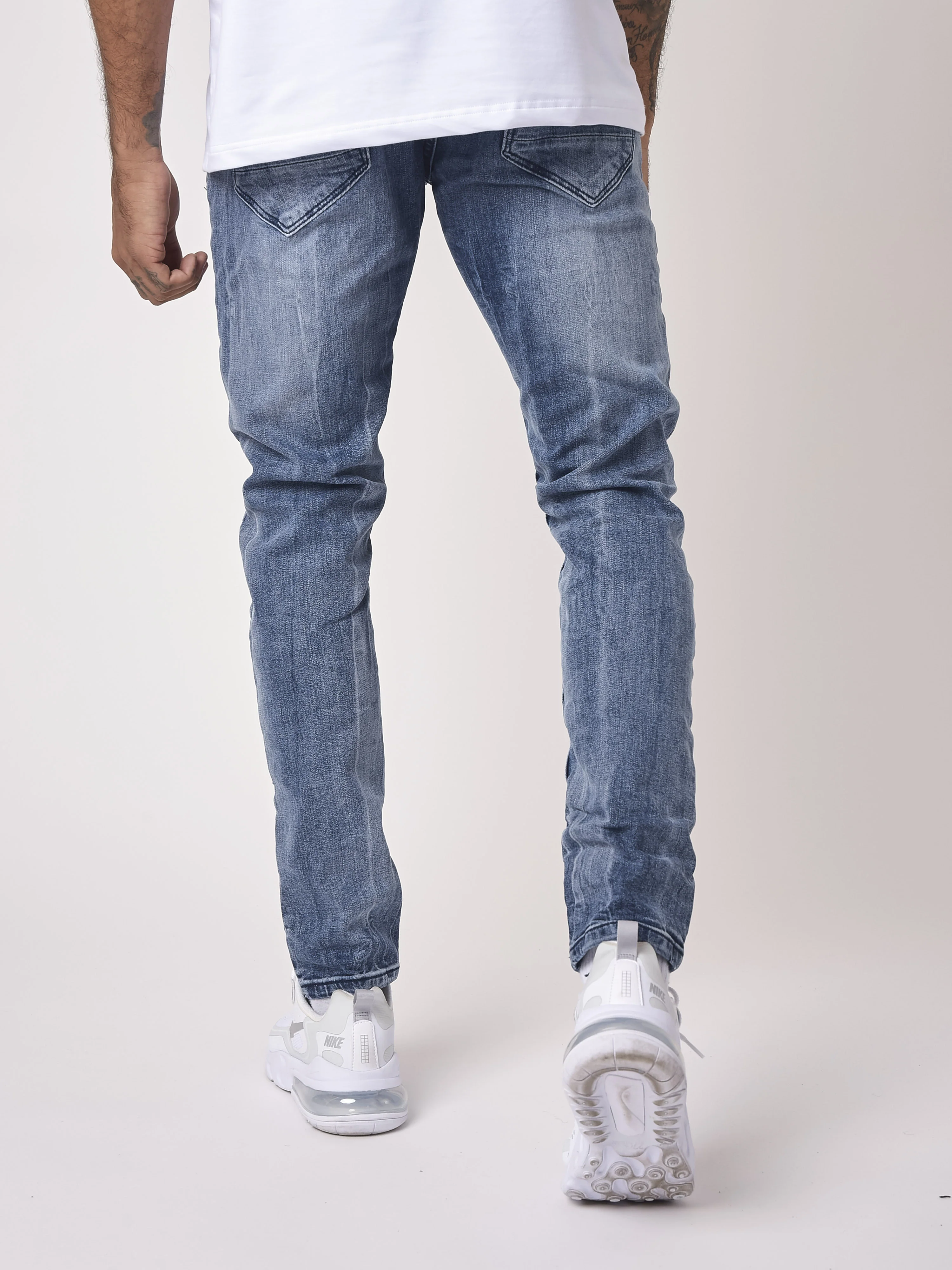 Jean slim bleu grisé effet usé et trous - Image 4